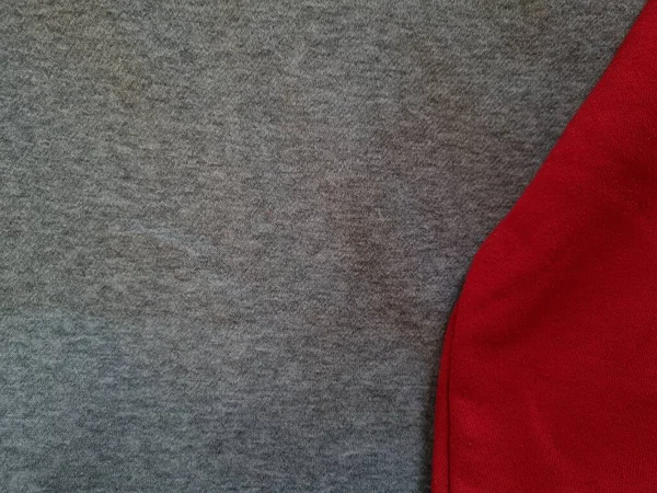 Soyut kumaş arka plan. Gri giysiler kırmızı ile birleştirilmiş.