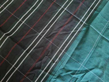 Yeşil sarong desenli soyut arkaplan ve bir kutu oluşturmak için satır kombinasyonu