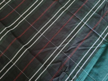 Yeşil sarong desenli soyut arkaplan ve bir kutu oluşturmak için satır kombinasyonu