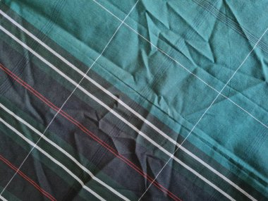 Yeşil sarong desenli soyut arkaplan ve bir kutu oluşturmak için satır kombinasyonu