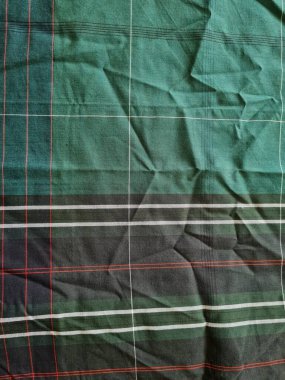 Yeşil sarong desenli soyut arkaplan ve bir kutu oluşturmak için satır kombinasyonu