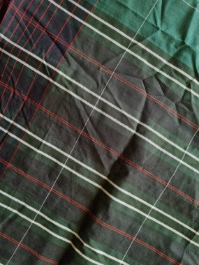 Yeşil sarong desenli soyut arkaplan ve bir kutu oluşturmak için satır kombinasyonu