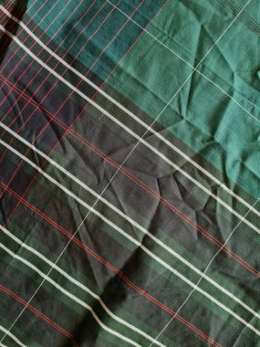 Yeşil sarong desenli soyut arkaplan ve bir kutu oluşturmak için satır kombinasyonu