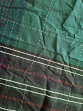 Yeşil sarong desenli soyut arkaplan ve bir kutu oluşturmak için satır kombinasyonu