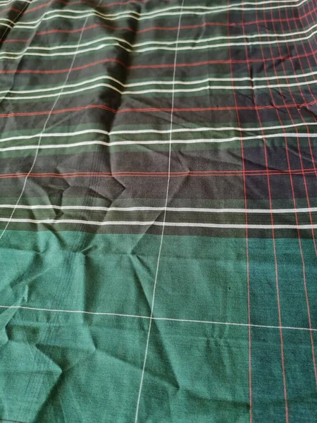 Yeşil sarong desenli soyut arkaplan ve bir kutu oluşturmak için satır kombinasyonu