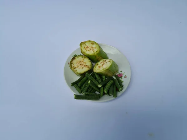 Slices Green Eggplant Green Beans Isolated White Blue Combination — Fotografia de Stock