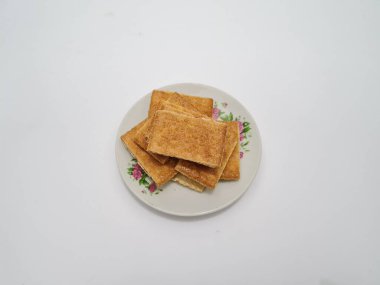 Un ve çikolata tadı olan diğer malzemelerden yapılan abur cuburlara bisküvi denir.