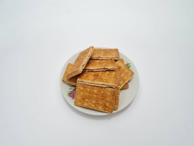 Un ve çikolata tadı olan diğer malzemelerden yapılan abur cuburlara bisküvi denir.