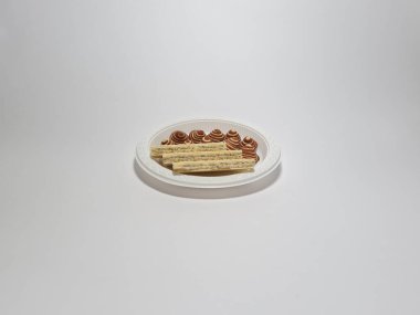 Çikolatalı gofret atıştırmalıkları ve küçük fil kulakları.