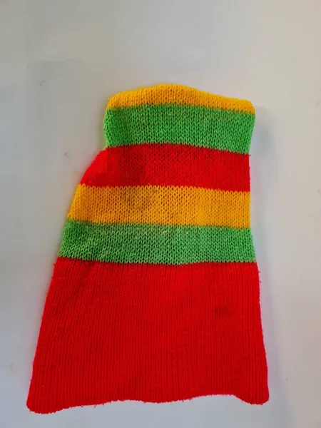 Toddler Hat Made Yarn Sharp Red Green Yellow Shape — стоковое фото