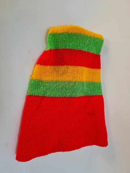 Toddler Hat Made Yarn Sharp Red Green Yellow Shape — стоковое фото