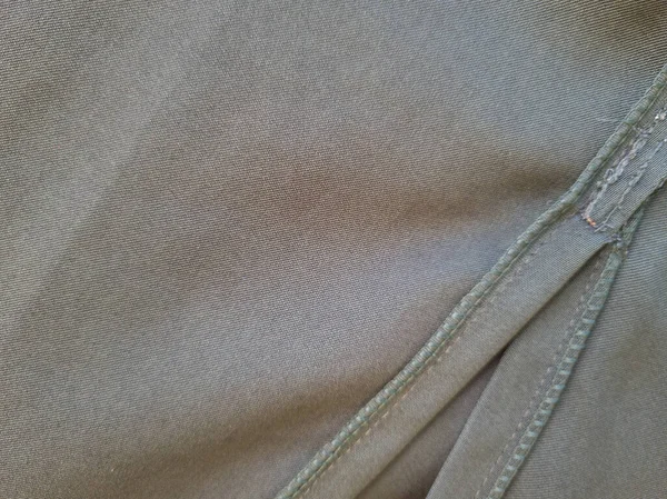 Soyut arkaplan desenli gri kumaş bir gölge oluşturmak için katlandı