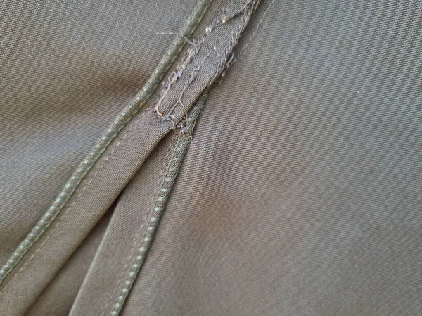 Soyut arkaplan desenli gri kumaş bir gölge oluşturmak için katlandı