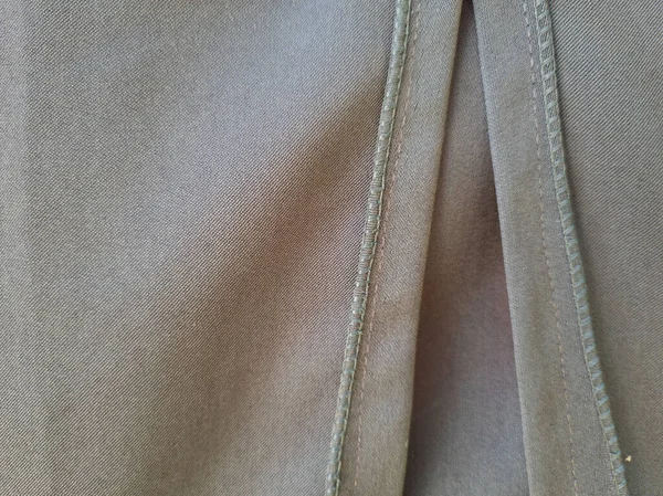 Soyut arkaplan desenli gri kumaş bir gölge oluşturmak için katlandı