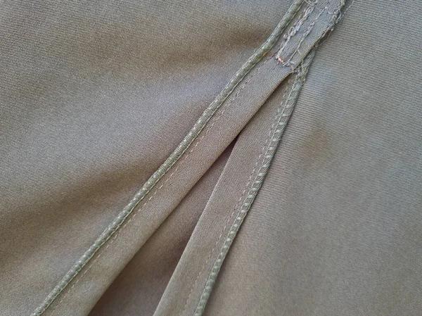 Soyut arkaplan desenli gri kumaş bir gölge oluşturmak için katlandı