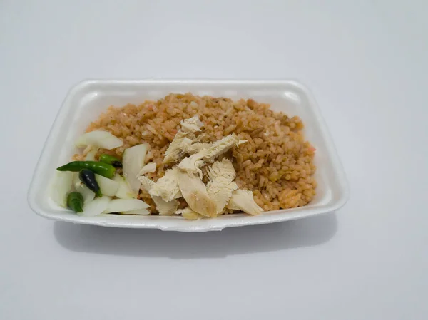 Food from Indonesia called rujak contains rice cake, vegetables cooked in water, and savory spices