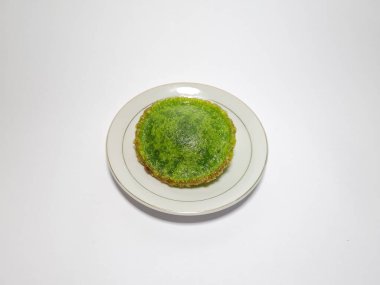 Bu yiyeceğe kucur denir, Endonezya 'dan gelmektedir, küçük bir tabakta kahverengi bir rengi vardır.