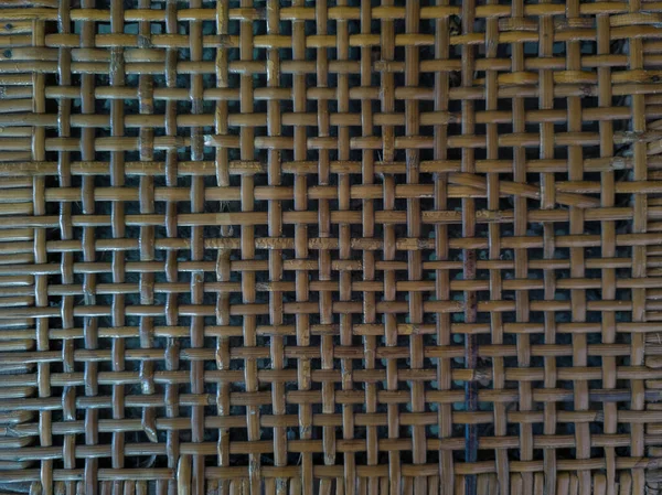 Kahverengi rattan yapılmış soyut arkaplan desenli sandalye koltuğu