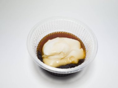 Endonezya 'dan gelen yiyecek, Jenang' ı beyaz bir konteynırda çağırdı.