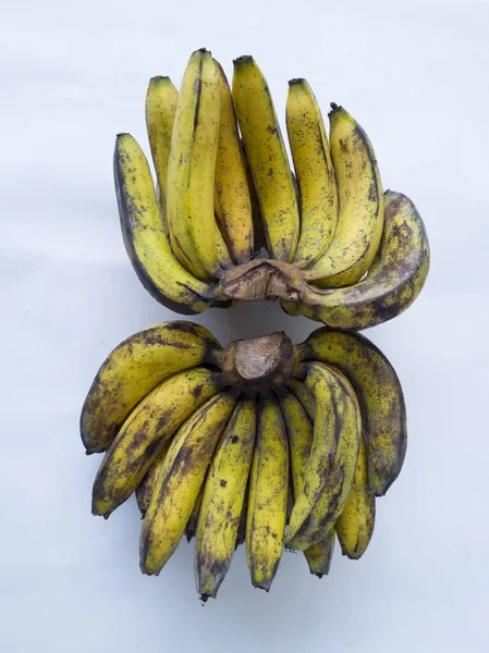 Ripe Bananas Blackish Green White Background — Zdjęcie stockowe
