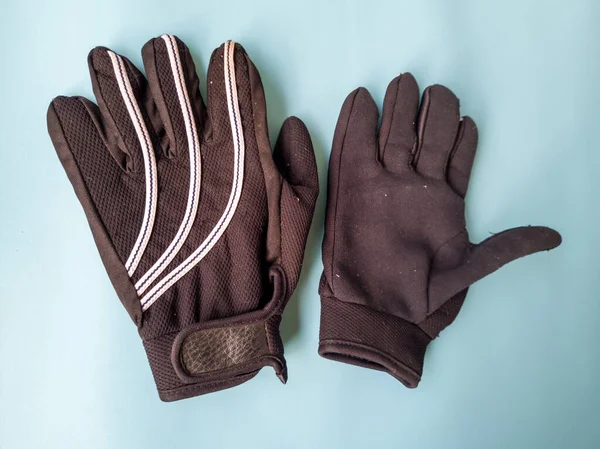 Gloves for motorcycles in black with white stripes