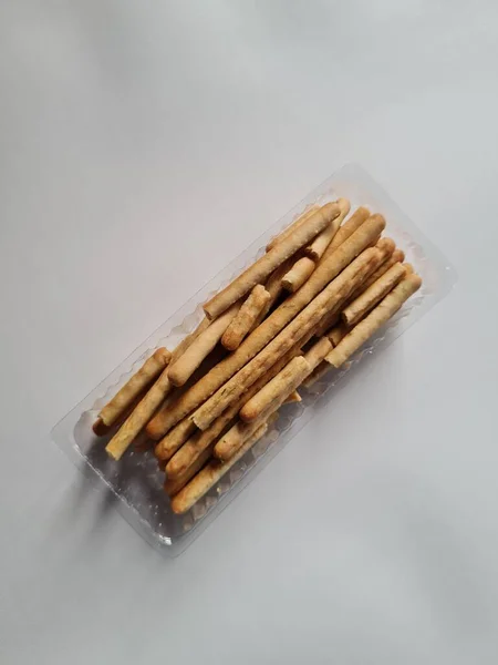 Snacks Namely Crispy Savory Sticks Plastic Container — стоковое фото