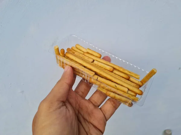 Hands Holding Light Snacks Namely Crunchy Sticks Savory Taste — Fotografia de Stock