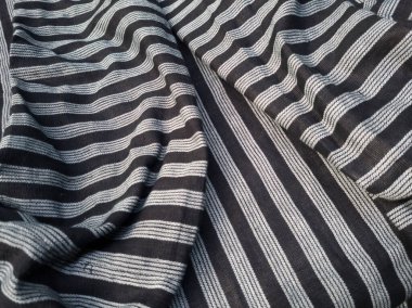 Soyut siyah beyaz çizgili kumaş desenli arkaplan