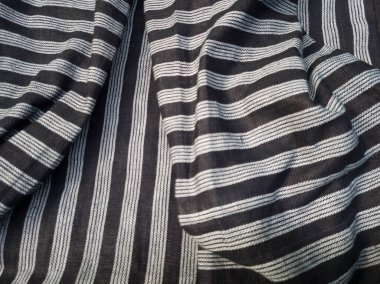 Soyut siyah beyaz çizgili kumaş desenli arkaplan