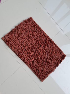 Doormat for the house that is fluffy on the floor