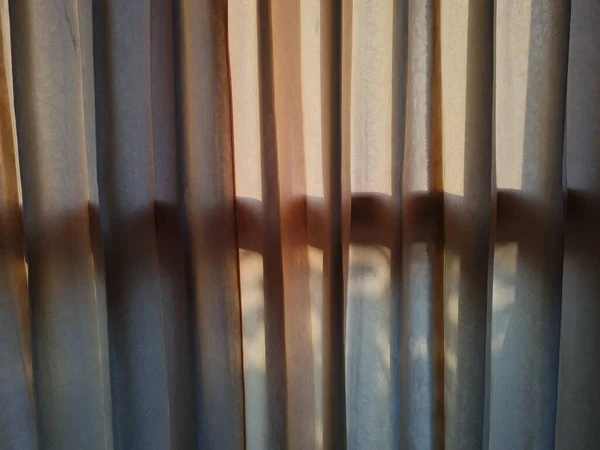 Abstract Background Textured Brown Window Curtains Exposed Sunlight Shadows Appear — Foto Stock