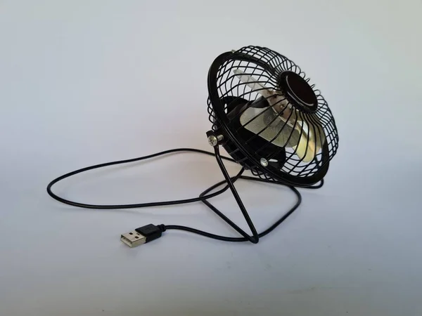 Portable fan in black on white background