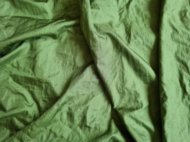 Abstract green textured mukena cloth background