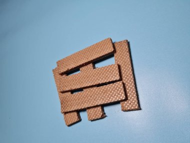 Crunchy snacks made of flour and other ingredients chocolate wafers