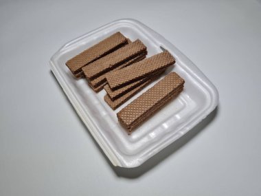 Crunchy snacks made of flour and other ingredients chocolate wafers