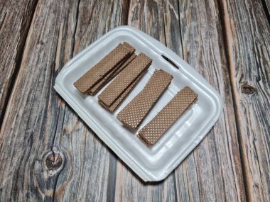 Crunchy snacks made of flour and other ingredients chocolate wafers