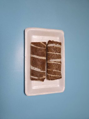 A typical Indonesian snack made from flour and other ingredients called omelet rolls sweet