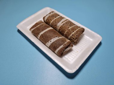 A typical Indonesian snack made from flour and other ingredients called omelet rolls sweet