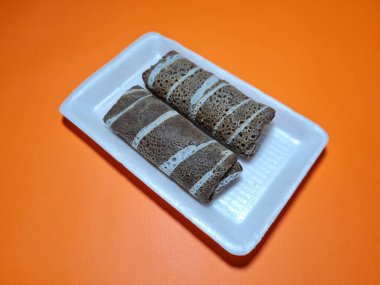 A typical Indonesian snack made from flour and other ingredients called omelet rolls sweet