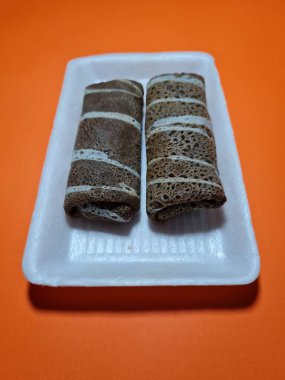 A typical Indonesian snack made from flour and other ingredients called omelet rolls sweet