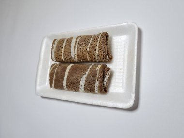 A typical Indonesian snack made from flour and other ingredients called omelet rolls sweet