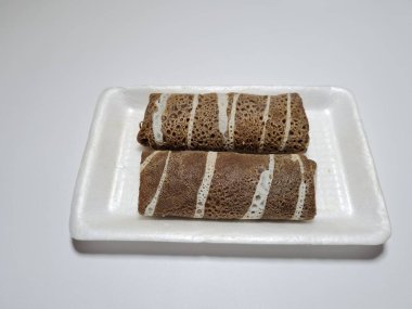 A typical Indonesian snack made from flour and other ingredients called omelet rolls sweet