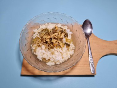 Typical Indonesian cuisine, which consists of white rice, fried chicken slices, and other toppings plus a delicious sauce, namely Soto Ayam.