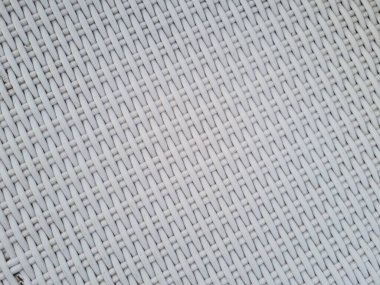 Chair background made of white textured abstract plastic