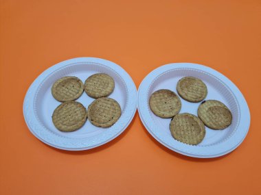 Biscuits made from wheat filled with chocolate
