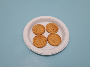 Biscuits made from wheat filled with chocolate