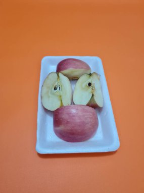 Sweet red fresh apples can contain vitamins and minerals that are good for our bodies