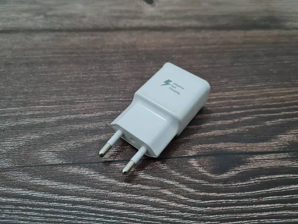 White cell phone chargers are usually used by cellphones that have run out of battery power