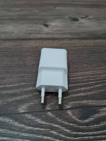 White cell phone chargers are usually used by cellphones that have run out of battery power