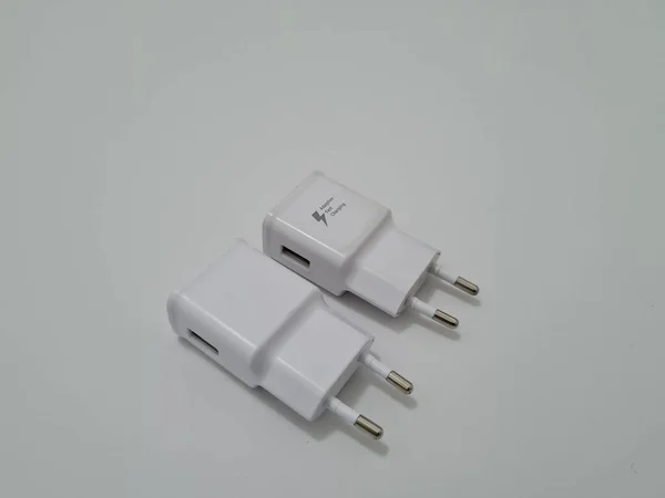 White cell phone chargers are usually used by cellphones that have run out of battery power
